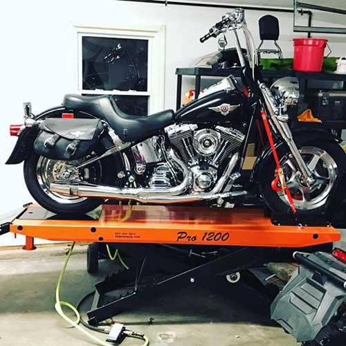 2001 Harley Davidson Fatboy atop PRO 1200 motorcycle lift table