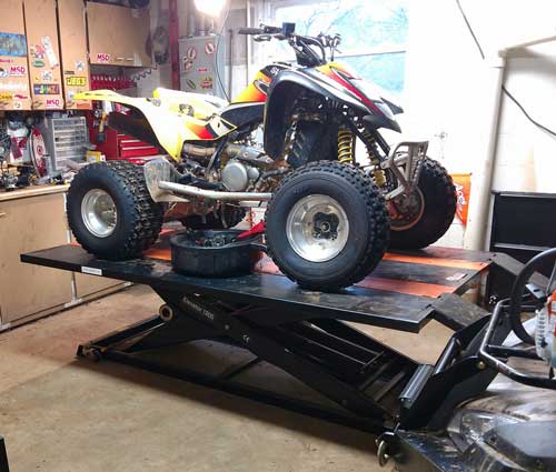 Suzuki Quadsport ATV on Elevator 1800 lift table