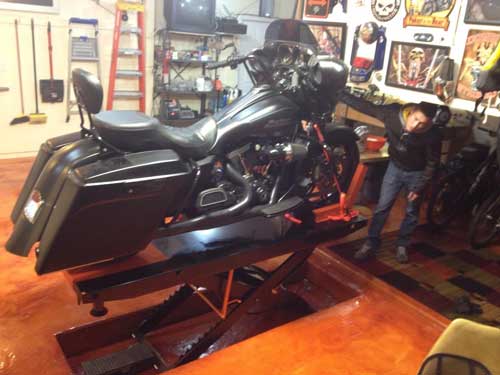 PRO 1200 motorcycle lift gets installed flush with floor 