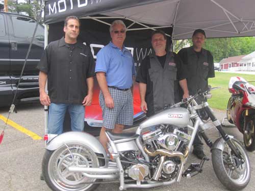 (From L to R) Louis Lopez, Management; Clark Heintz; Mark Klein owner DAM Motorcycles; John Vandervliet, Technician  DAM Motorcycles AMSOIL Full Service Event team ...endorsed and performed motorcycle services at the 2013 Laconia Motorcycle Week, exclusively using the Pro 1200 motorcycle lift supplied by Mr. Clark Heintz of NHProEquip.com