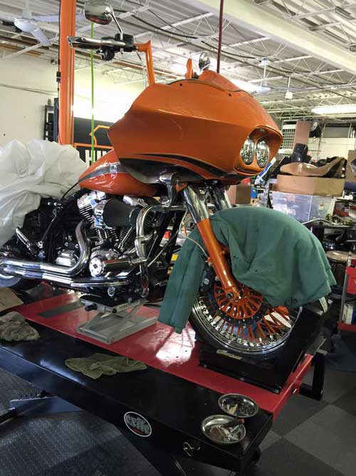 Slick Customs works on a 2013 HD FLTR on their PRO 1200 Motorcycle Lift