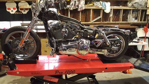 Harley Dyna getting repairs pro 1200 motorcycle lift