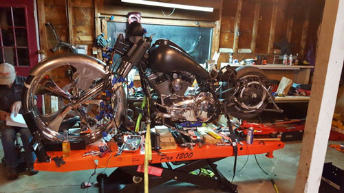 Garage building a 30" frame laying Road glide with my Pro 1200