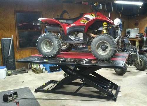 Polaris Scrambler 500 4x4 Lifted on Elevator 1800U lift