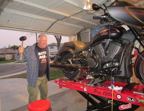 Eric works on friend's Victory motorcycle using PRO 1200 motorcycle lift