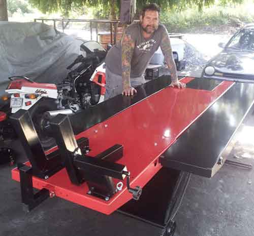 John Henwood poses with his PRO 1200 Motorcycle Lift