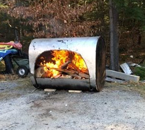 oil tanked turned outdoor fireplace using plasma cutter