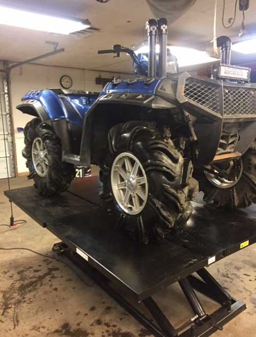 Polaris Sportsman on 2000lb electric lift