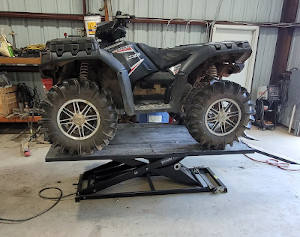 Polaris Sportsman on Elevator 1100 ATV Lift