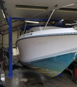 PRO 11000C-DX 2 Post Lift lifting boat for repairs