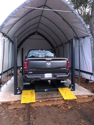 Ouellettes Auto Repair's Storage Lift for Oil Undercoats
