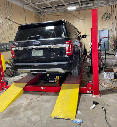The Performance Place in NH PRO-14AE 4 Post Alignment Lift with Ford Expedition