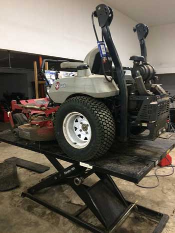 XMark Zero Turn Mower on Elevator 1800 Lift